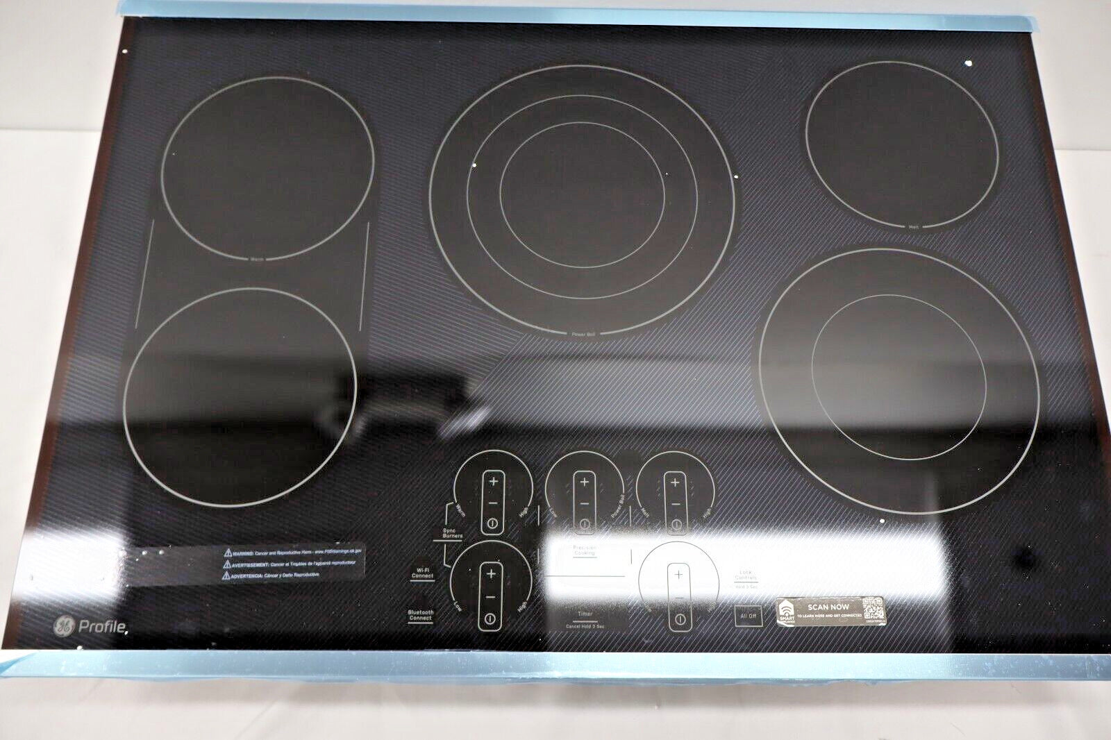 GE Profile PEP9030STSS - 30" Electric Built In Cooktop, Stainless Steel on Black