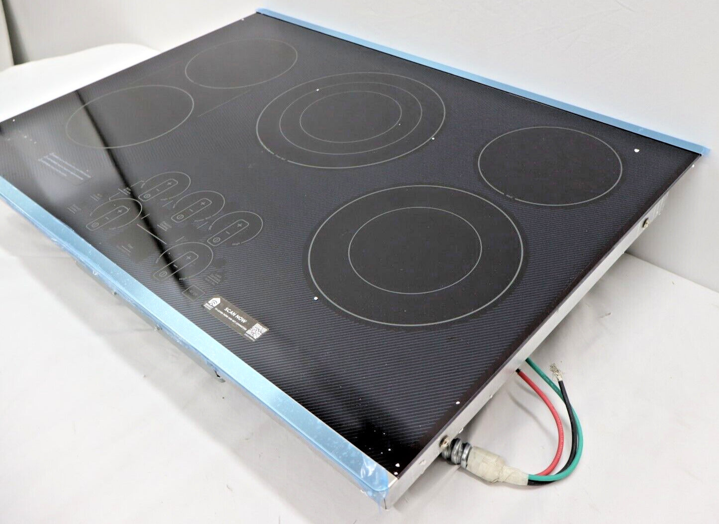 GE Profile PEP9030STSS - 30" Electric Built In Cooktop, Stainless Steel on Black